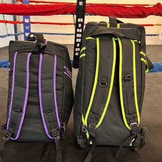 purple and black and neon yellow and black gymbag with backpack straps showing 