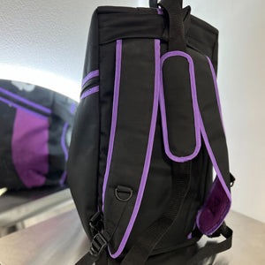 backpack straps of the purple and black gym bag